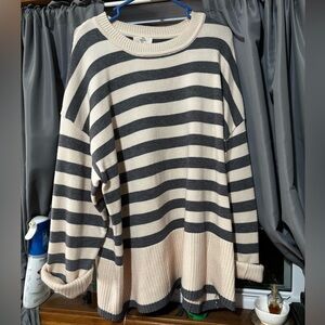 Boutique sweater, never worn, cream color with grey strips.